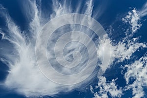 White clouds on blue background