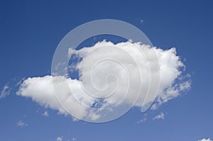 White clouds on a blue sky. Background