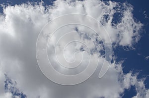 White clouds on a blue sky. Background