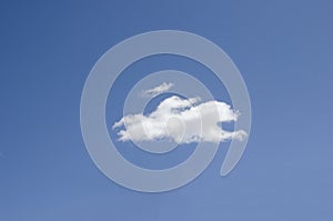 White clouds on a blue sky. Background