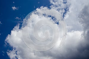 White clouds on a blue sky. Background