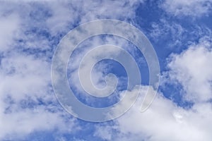 White clouds in the blue sky background