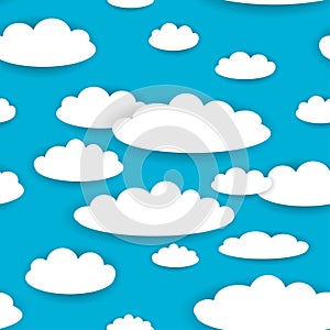 White clouds on blue sky seamless background pattern.