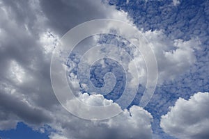 White clouds on blue sky in summer day background