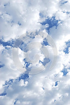 White clouds in bright blue sky