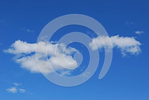 White clouds in bright blue sky