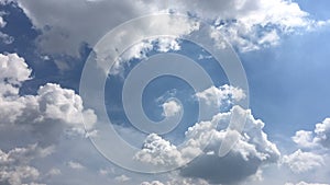 White clouds disappear in the hot sun on blue sky. Time-lapse motion clouds blue sky background. Blue sky. Clouds