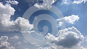 White clouds disappear in the hot sun on blue sky. Time-lapse motion clouds blue sky background. Blue sky. Clouds. Blue sky with w