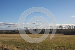 White clouds floating over the fields