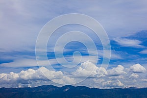 White clouds floating over land