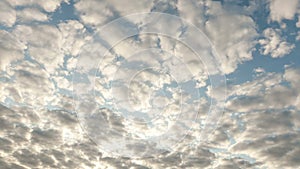 White clouds running over blue sky