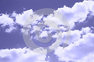 White clouds in the sky. Pantone`s color of the year 2022. Very peri. background and base for text photo