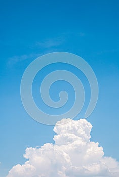 White clouds under blue sky.