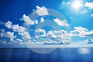 White cloudy with blue sky on the sea as background