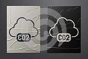 White CO2 emissions in cloud icon isolated on crumpled paper background. Carbon dioxide formula, smog pollution concept