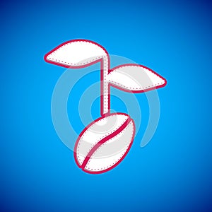 White Coffee beans icon isolated on blue background. Vector