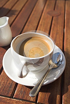 White coffee cup on table