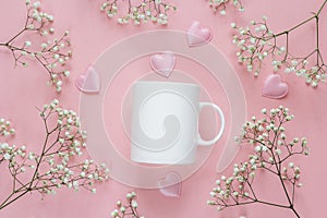 White coffee mug with delicate little white flowers and hearts o