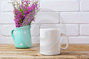 White coffee mug mockup with maroon purple flowers in mint pitch