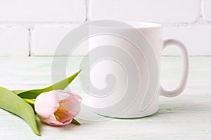 White coffee mug mockup with pink tulip