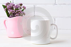 White coffee mug mockup with purple flowers in polka dot pink pi