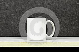 white coffee mug , white porcelain mug mock up on white wood table.