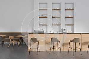 White coffee shop interior with bar counter and shelves