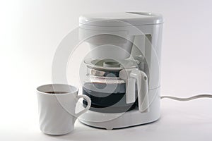 White coffeemaker, cup, isolated