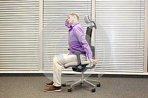 White collar worker male relaxing neck - demonstration