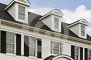 White colonial house with windows photo