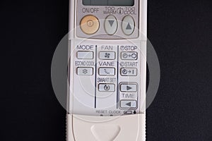 White color aircon controller from Mitsubishi. photo