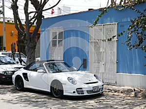 White color cinvertible Porsche 911 turbo in Lima
