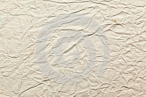 White color handmade paper of crumple or wrinkle texture with veins and fibers. Useful for background, 3d rendering.