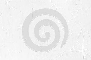 White colored low contrast Concrete textured background with roughness and irregularities