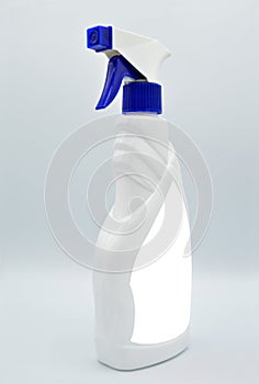 White colored plastic spray detergent bottle. Cosmetic, container