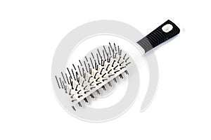 White comb with black handle isolated on white background, copy space