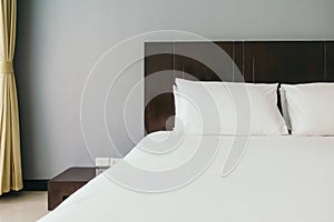 White comfortable pillow on bed