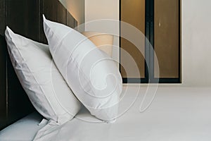 White comfortable pillow on bed