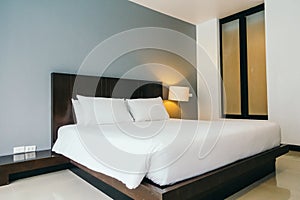 White comfortable pillow on bed