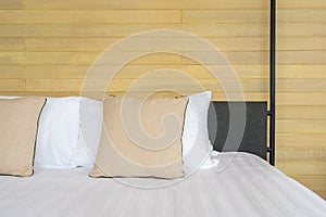 White comfortable pillow on bed decoration interior of bed room