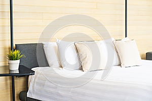 White comfortable pillow on bed decoration interior of bed room