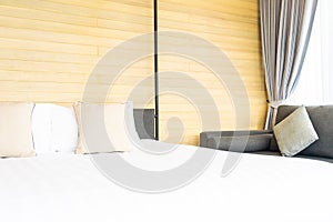 White comfortable pillow on bed decoration interior of bed room