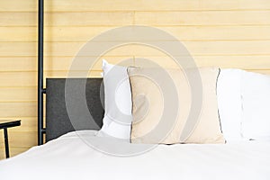 White comfortable pillow on bed decoration interior of bed room