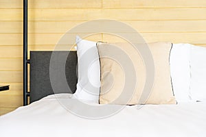 White comfortable pillow on bed decoration interior of bed room