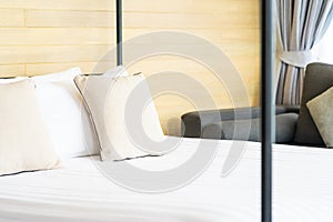 White comfortable pillow on bed decoration interior of bed room