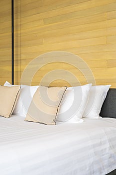 White comfortable pillow on bed decoration interior of bed room