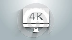 White Computer PC monitor display with 4k video technology icon isolated on grey background. 4K Video motion graphic