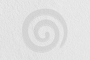 White concrete wall texture background. Uneven render stucco white painted concrete wall.