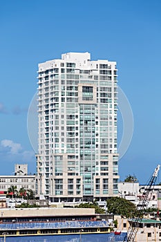 White Condo Building in Puerto Rico on Blue Sky photo