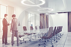 White conference room interior brown chairs people